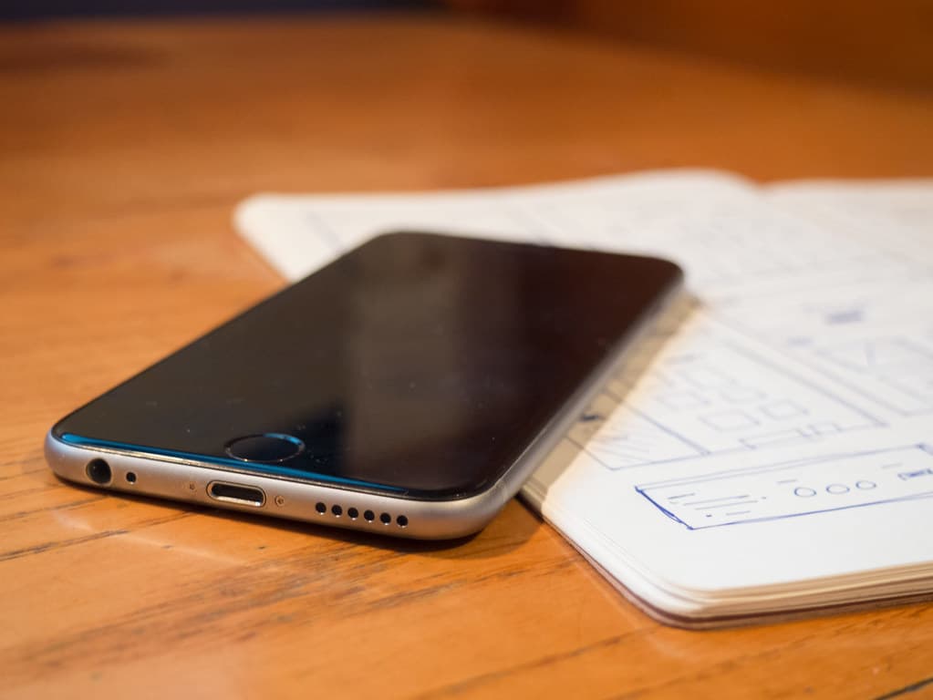 Phone and Journal on Desk
