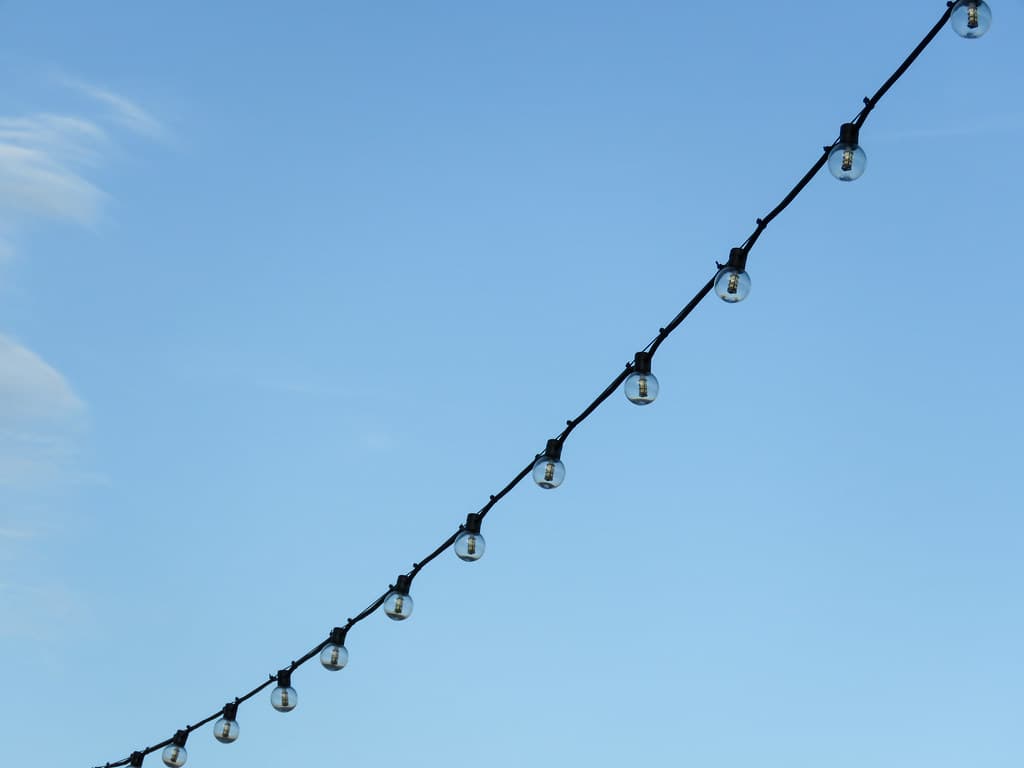 String of Lights with Blue Sky in Background