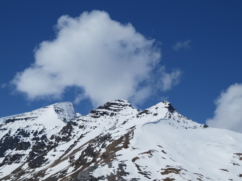 Mountains with Snow and Clouds