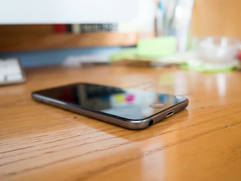 Black iPhone on Desk