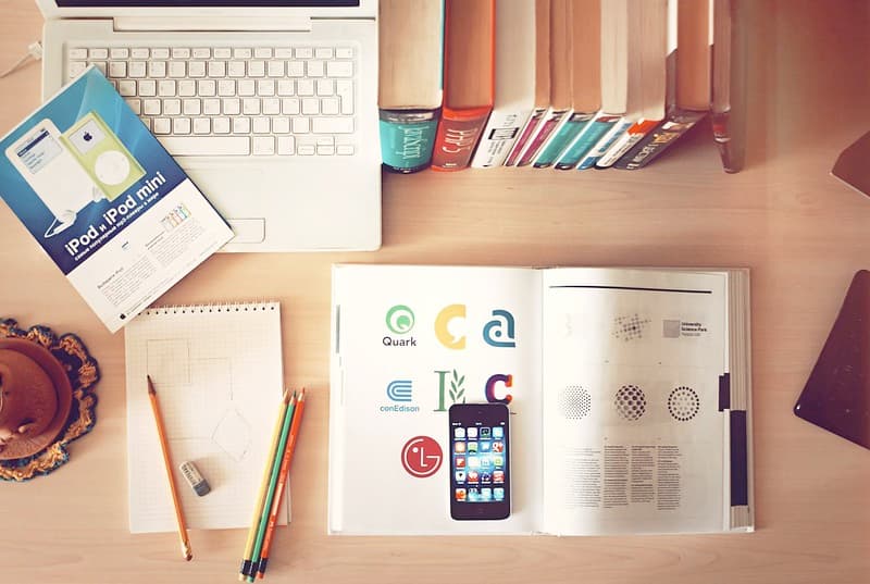 Desktop Still Life with Books and Laptop Computer