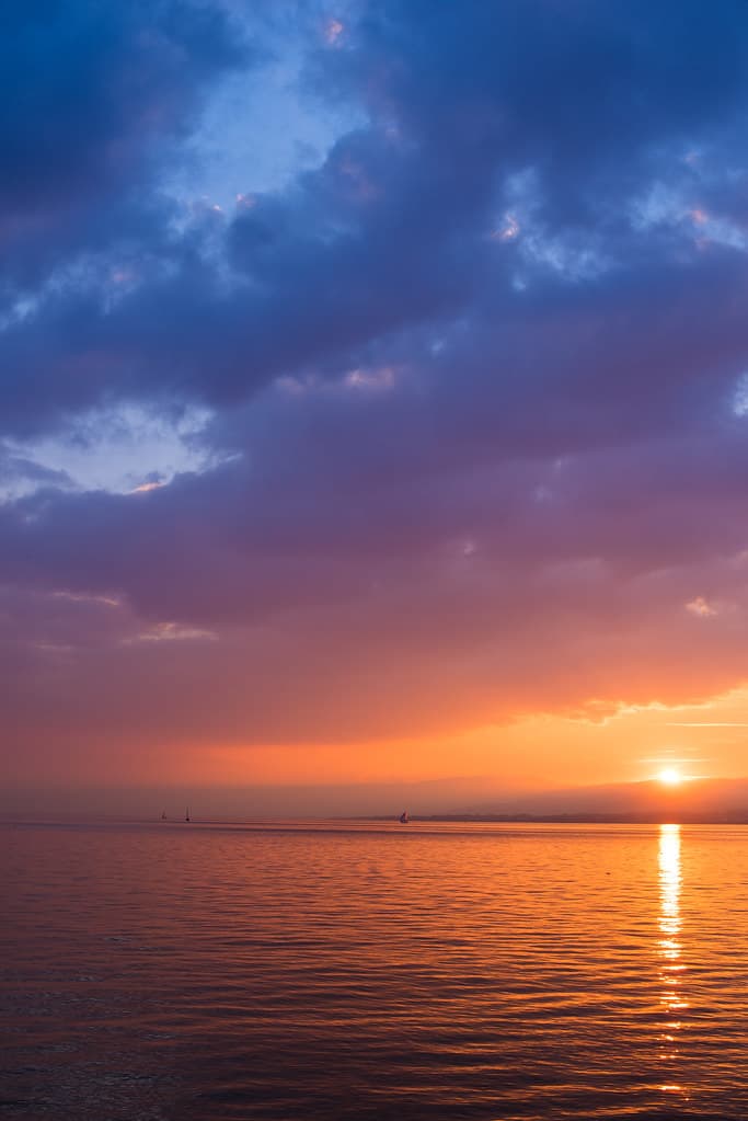 Sunset Reflected in Water with Clouds