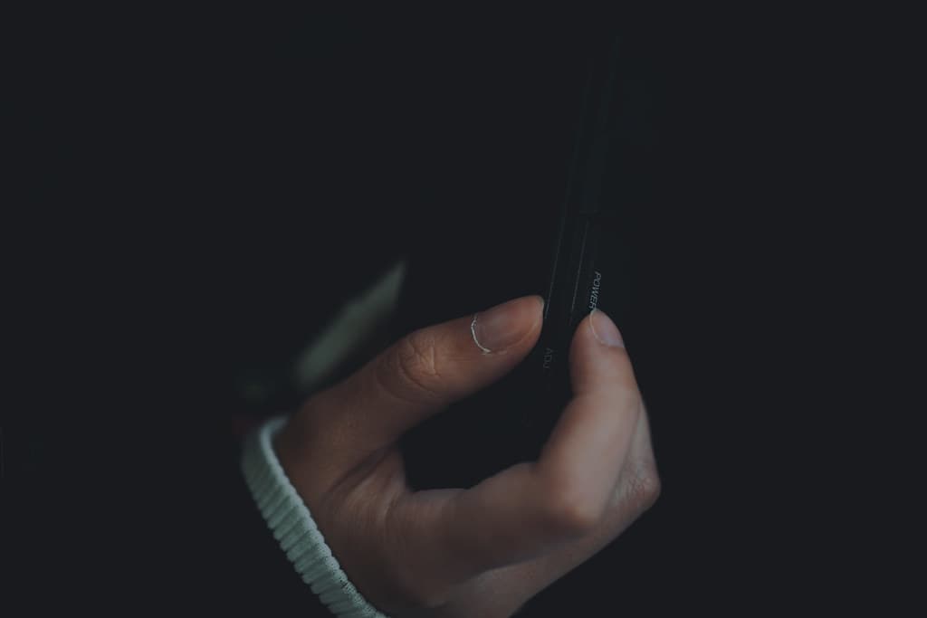 Hand Holding Electronic Device