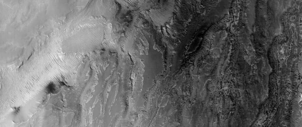 A Valley Network along the Wallrock in Melas Chasma