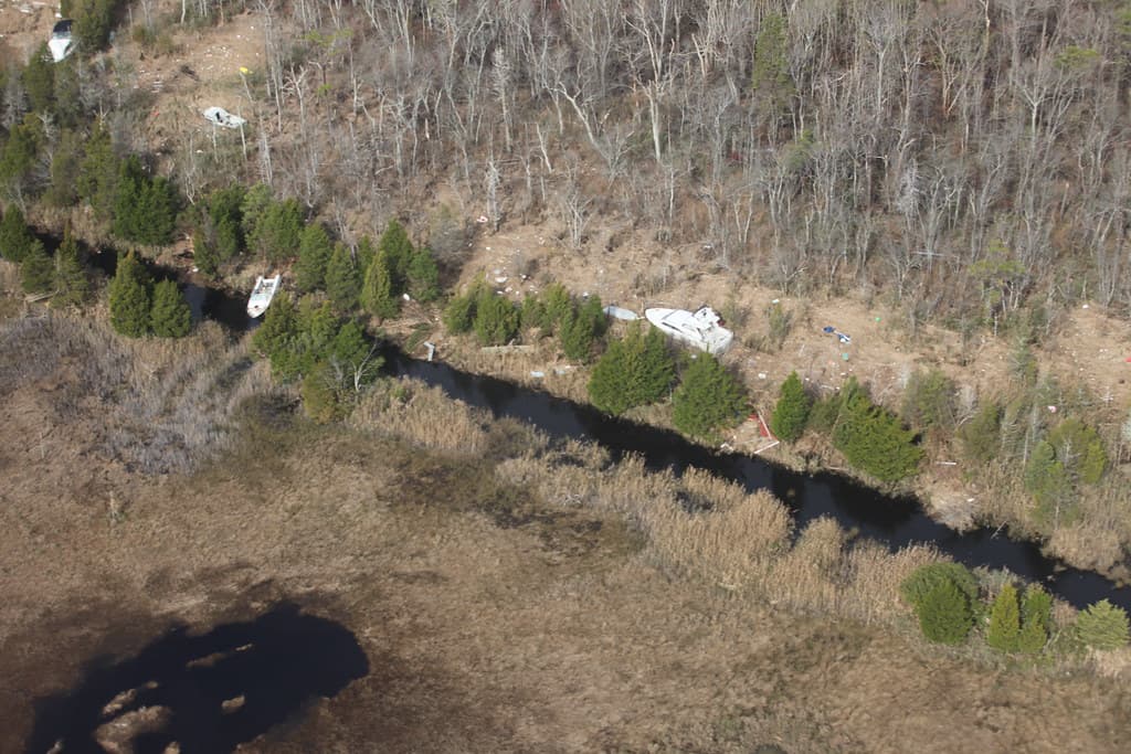 Boats washed ashore on Edwin B. Forsythe National Wildlife Refuge (NJ)