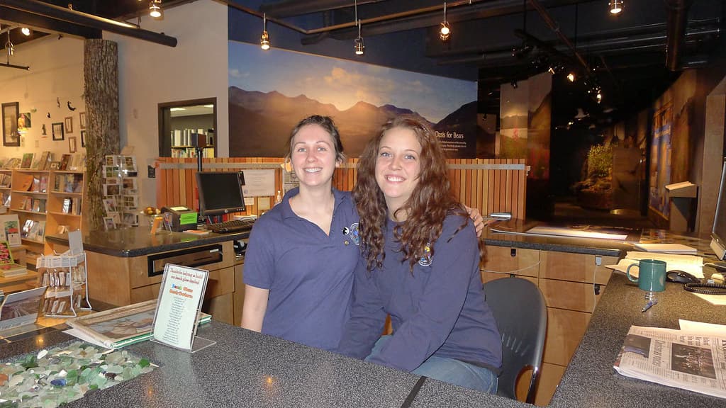 Volunteers at the information desk of Kodiak Refuge Visitor Center