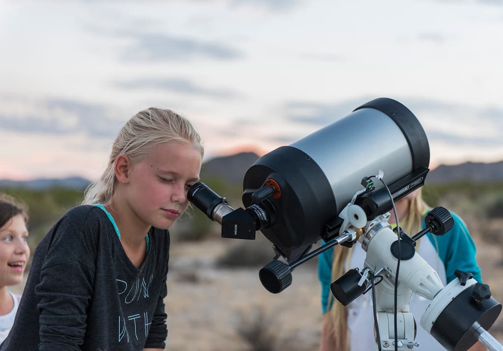 Observing the moon through a telescope; 2015 Night Sky Festival