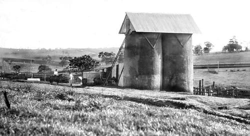 Two 100 ton silos on Mr A Cook's farm, Maleny, c 1930