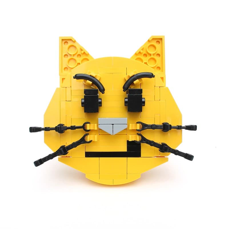 Bonus Brick-moji: Cat face with wry smile