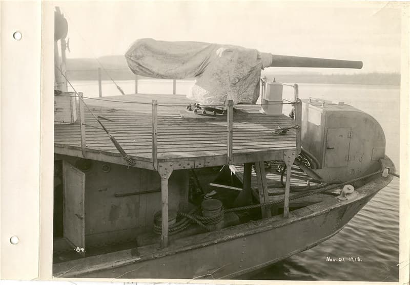 Gun at stern of boat being equipped
