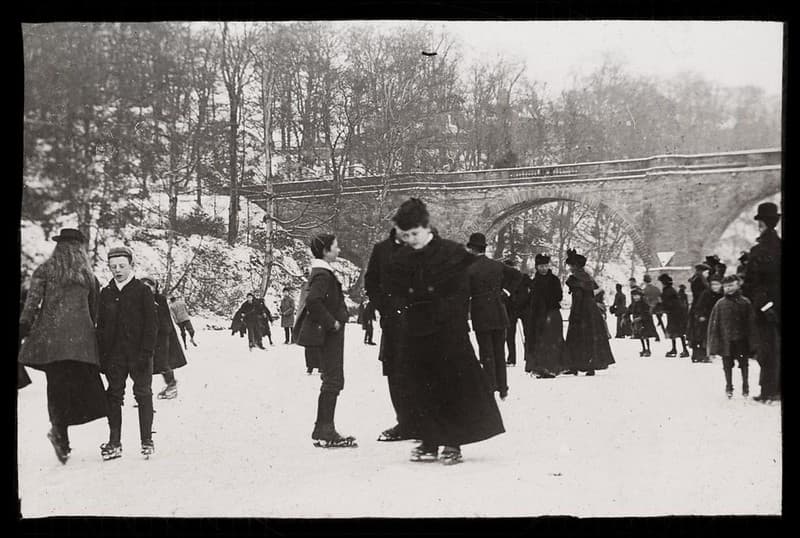 Ice skating on a frozen river, ca 1900