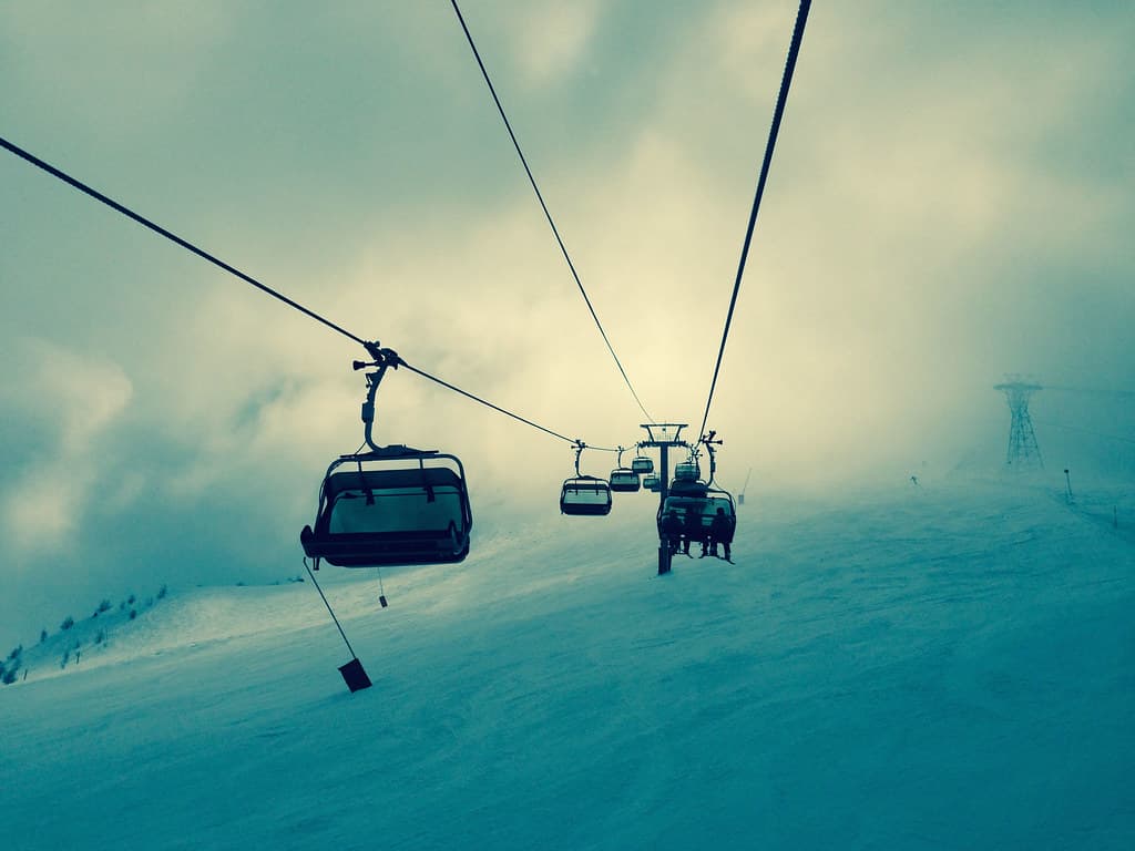 Ski Lift Over Snow with Clouds