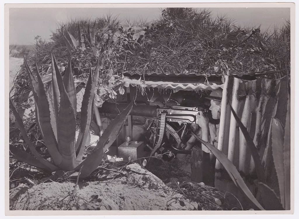 Soldier in a machine gun shelter, ca1940