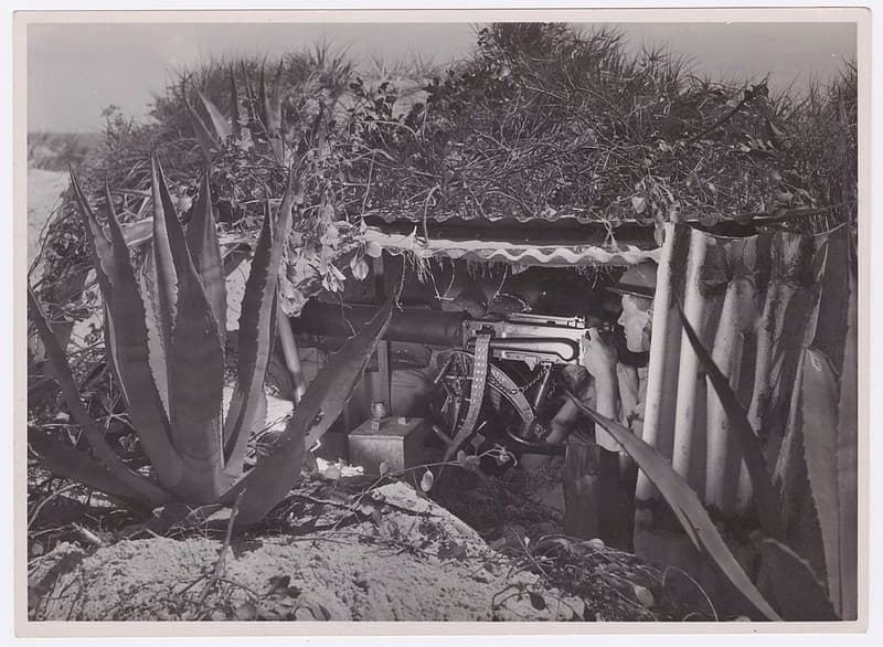Soldier in a machine gun shelter, ca1940