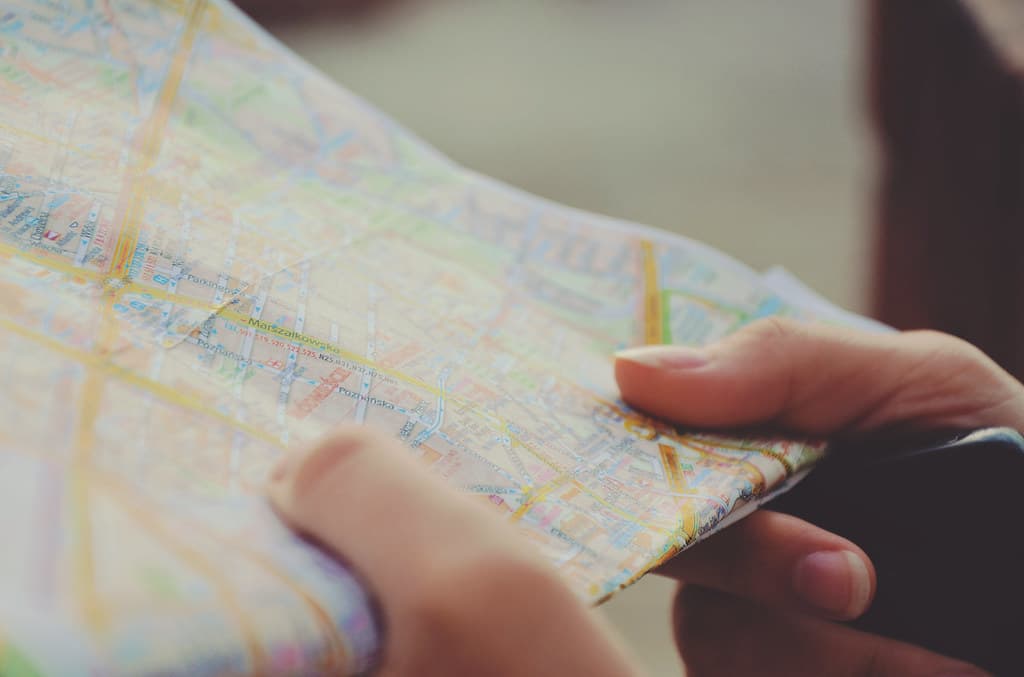 Hands Holding a Street Map