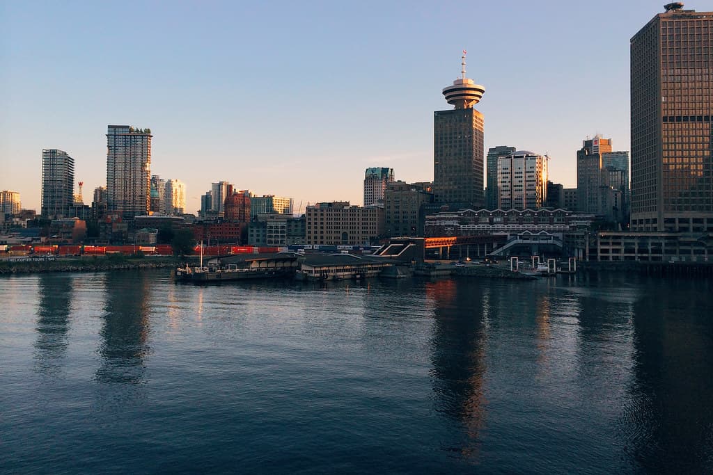 Urban City Shoreline with Piers and Boats