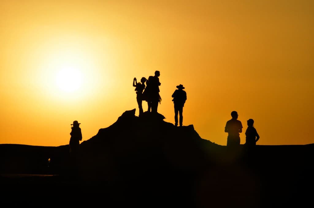 Silhouette's of People Outdoors at Sunset