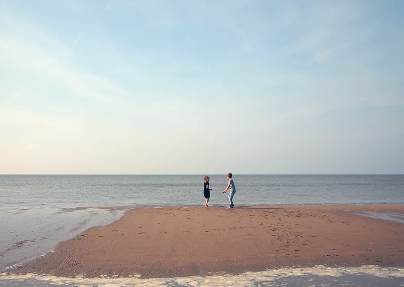 Two Children Playing on a Beach