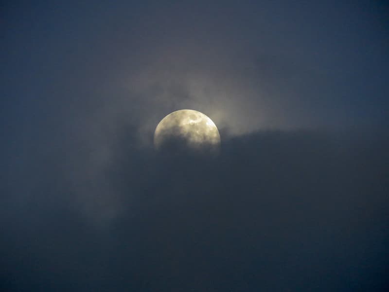 Full Moon Hidden Behind Clouds