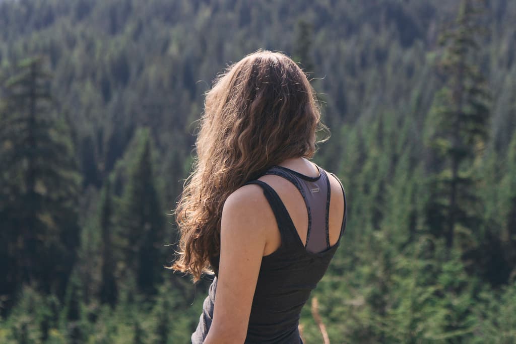 Female with Back Turned Overlooking Forest