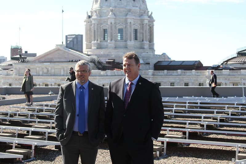 Senators Frentz and Simonson at the Rooftop Solar Panels