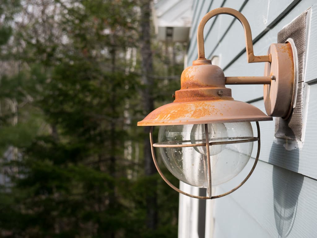 Rusting lamp in afternoon light