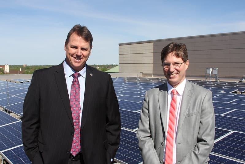 Senators Frentz and Eken at the Rooftop Solar Panels