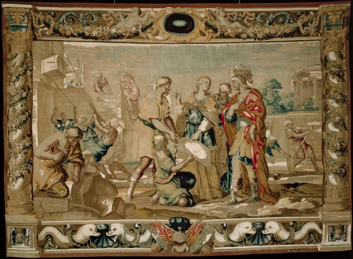 Dido shows Aeneas the plans for the fortifications of Carthage