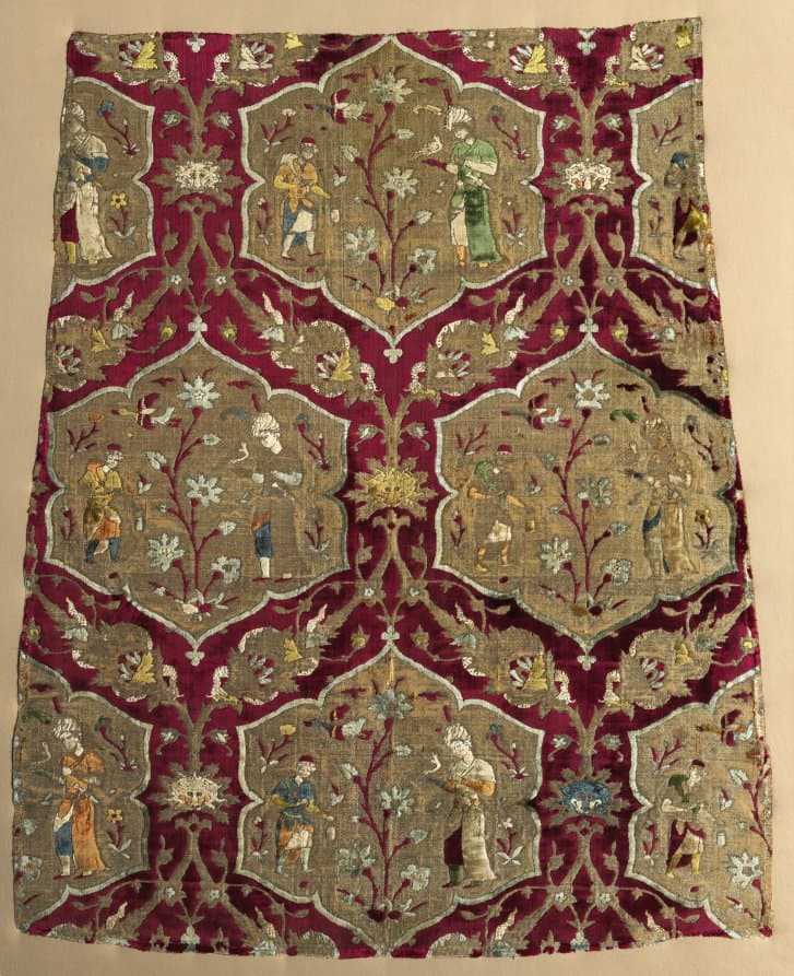 Fragment with falconer and attendant in animated lattice, from a robe