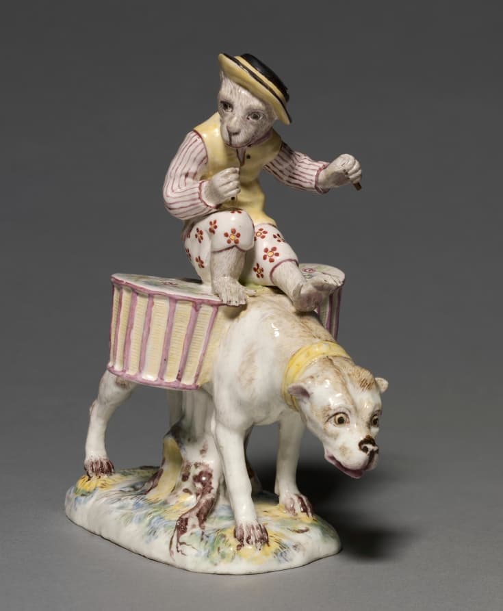 Figure of a Monkey on a Dog