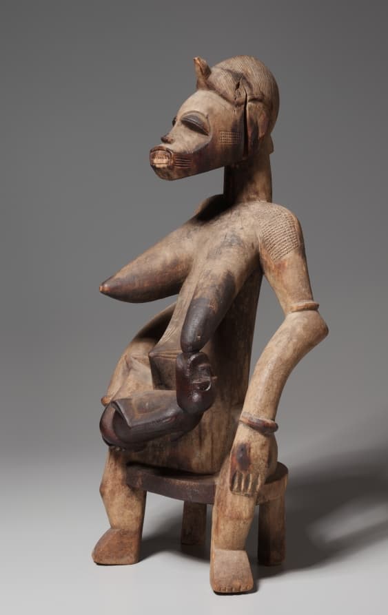 Nursing Woman with Child