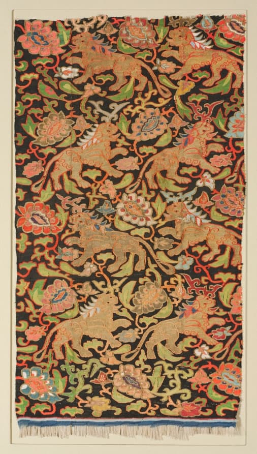 Tapestry with golden lions and palmettes