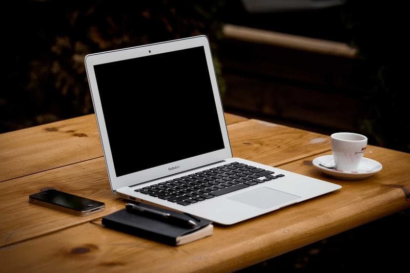 Laptop on a wooden desk