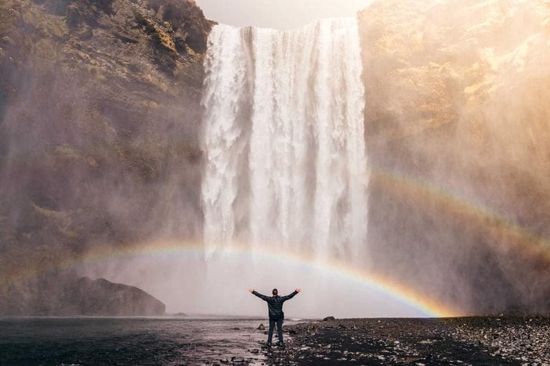 Arms up at the falls