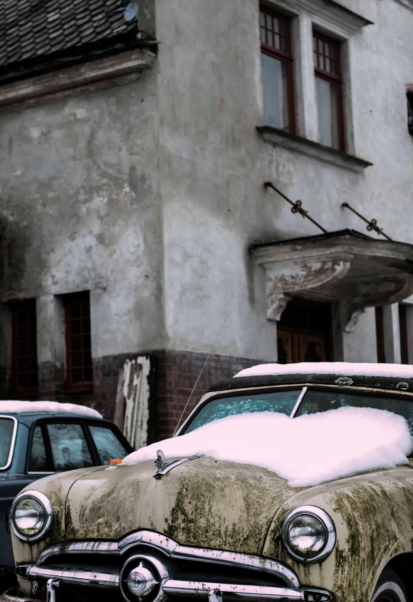 Car by a wall