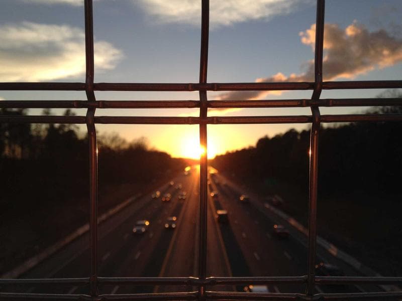 Sunset through a railing