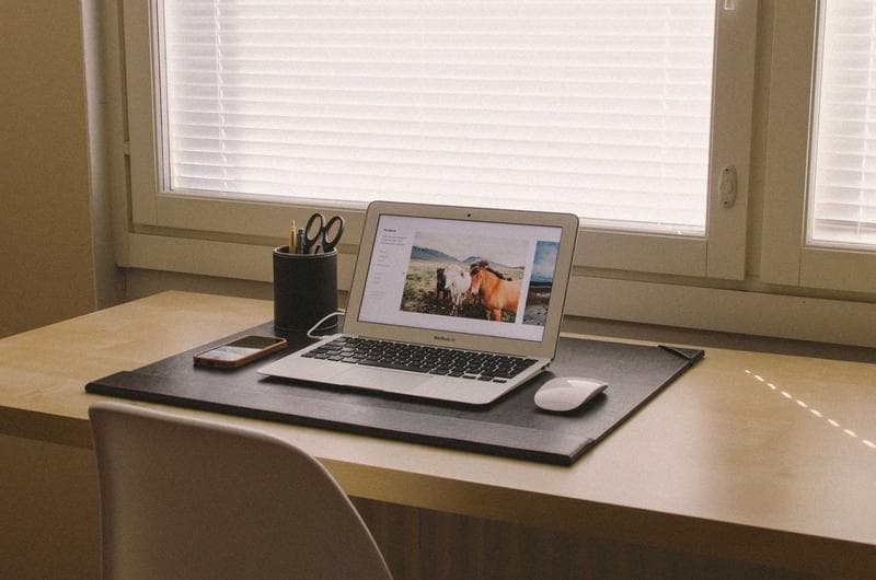 Laptop by a window