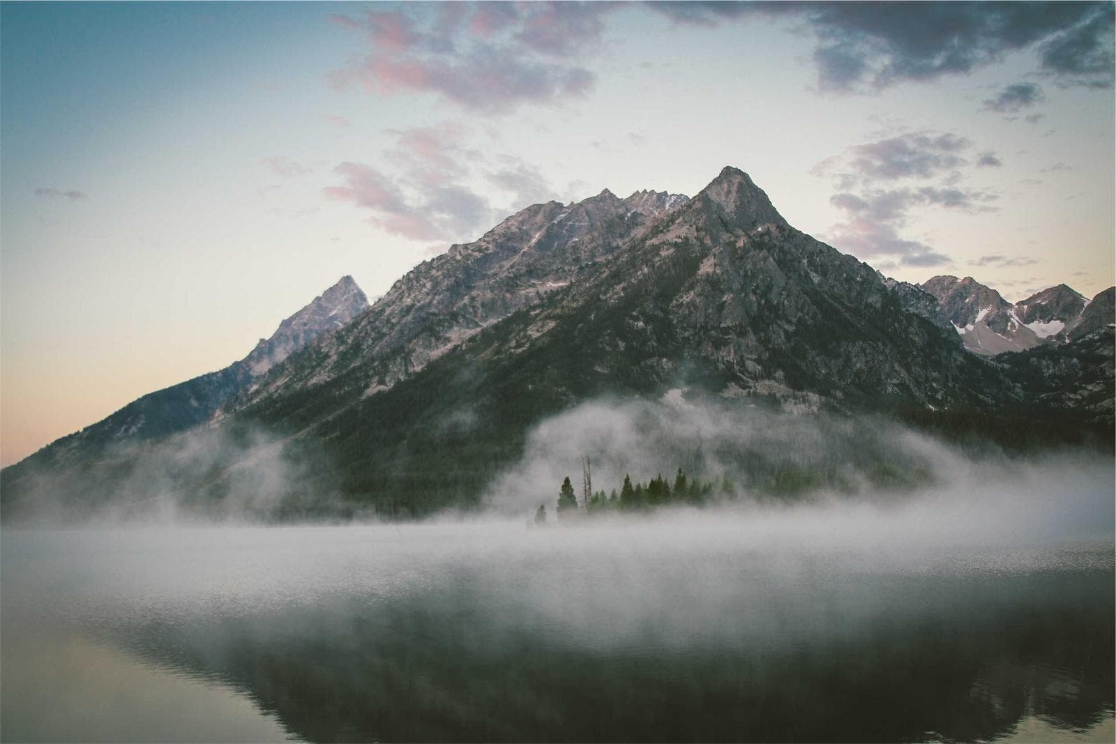 Mountain over fog