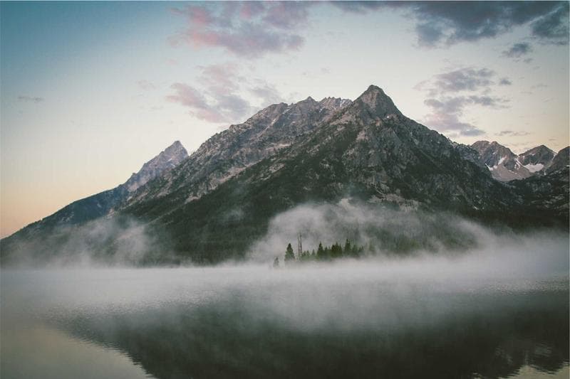 Mountain over fog