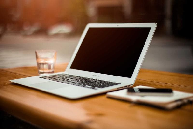 Laptop on a dark desk