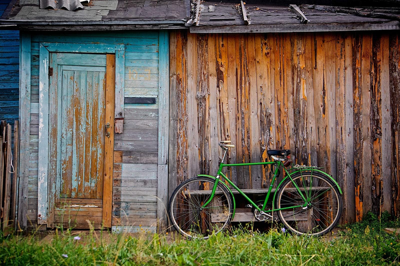 Bicycle against a shed
