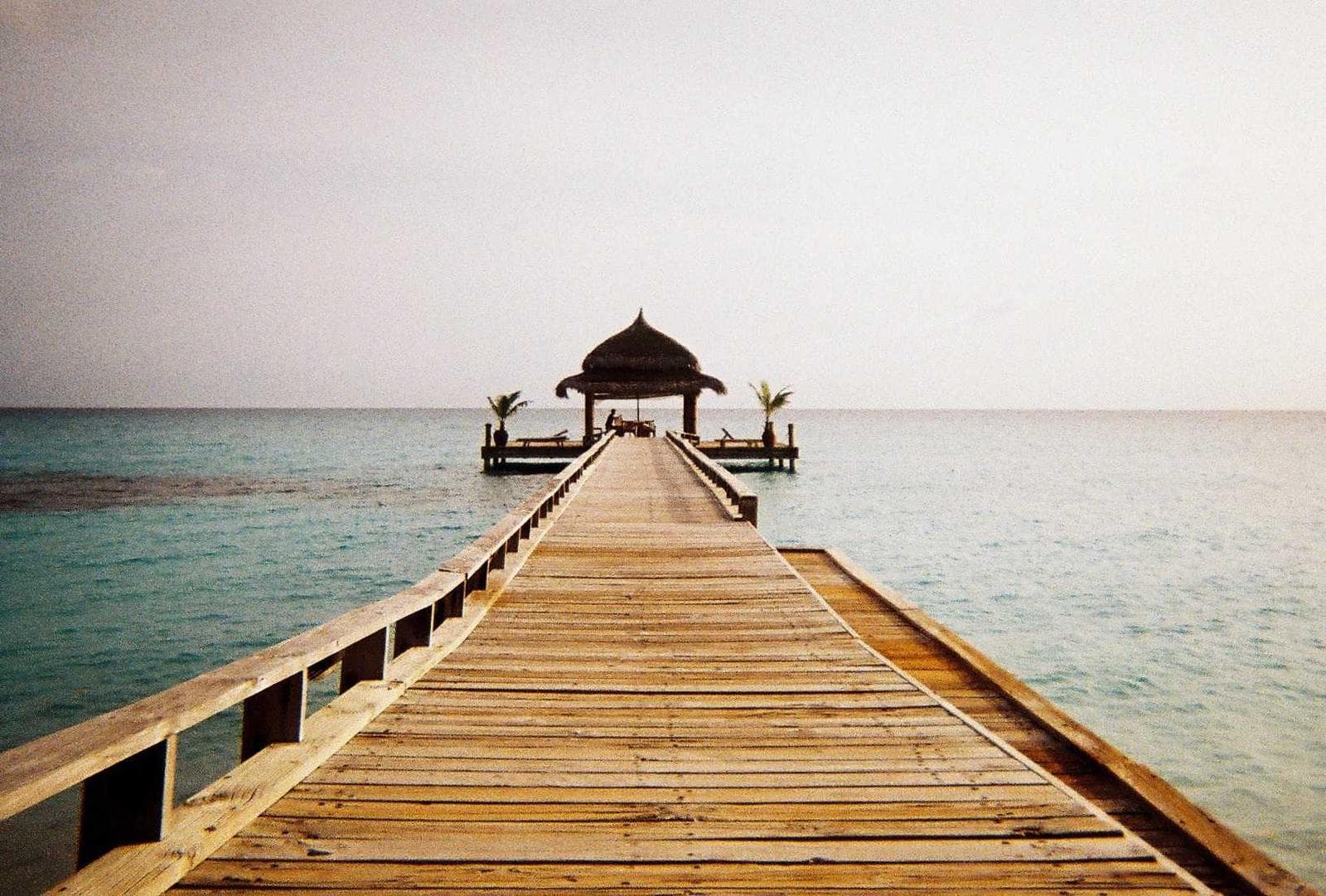 Jetty on a still lake