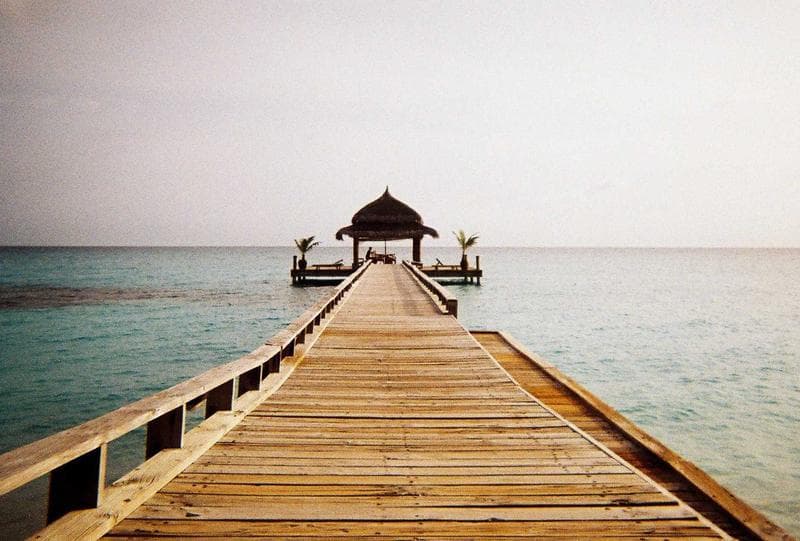 Jetty on a still lake