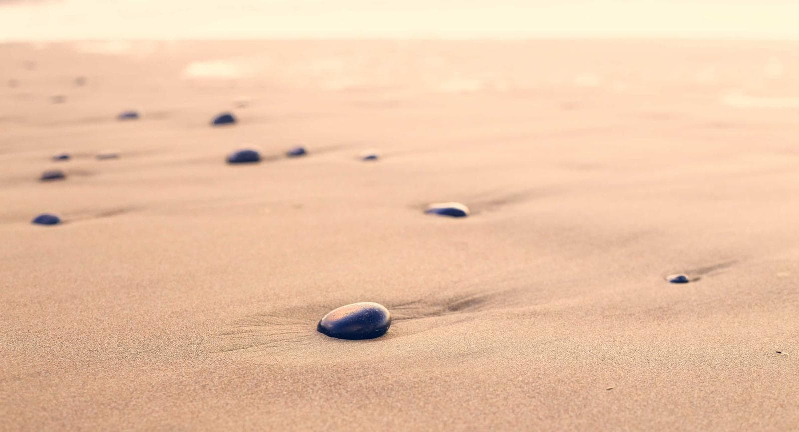 Stones on sand