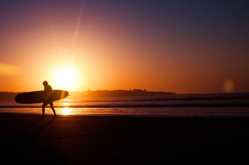Surfer at sunset