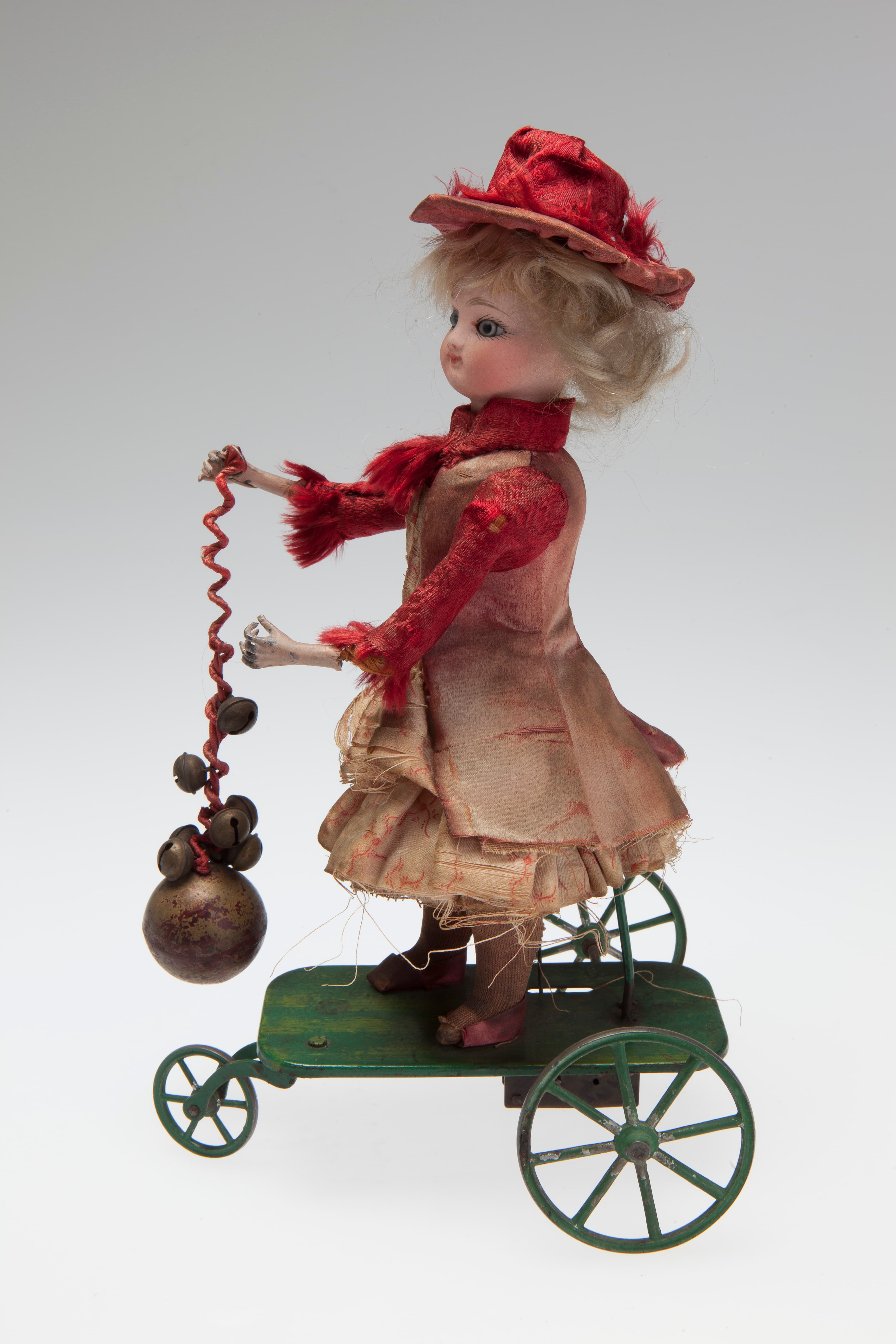Mechanical Clockwork Doll Ringing a Bell