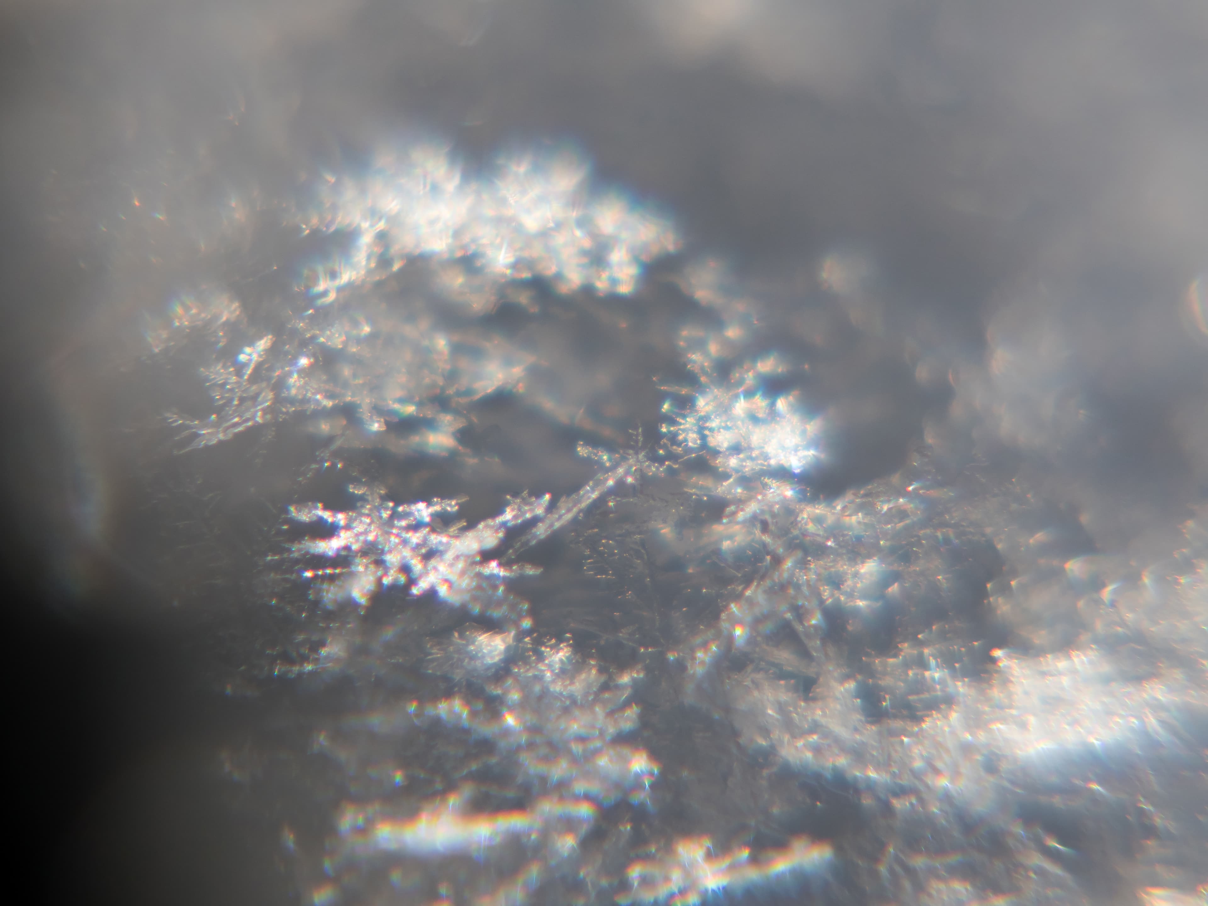 Snow crystals glittering in strong direct sunlight 21