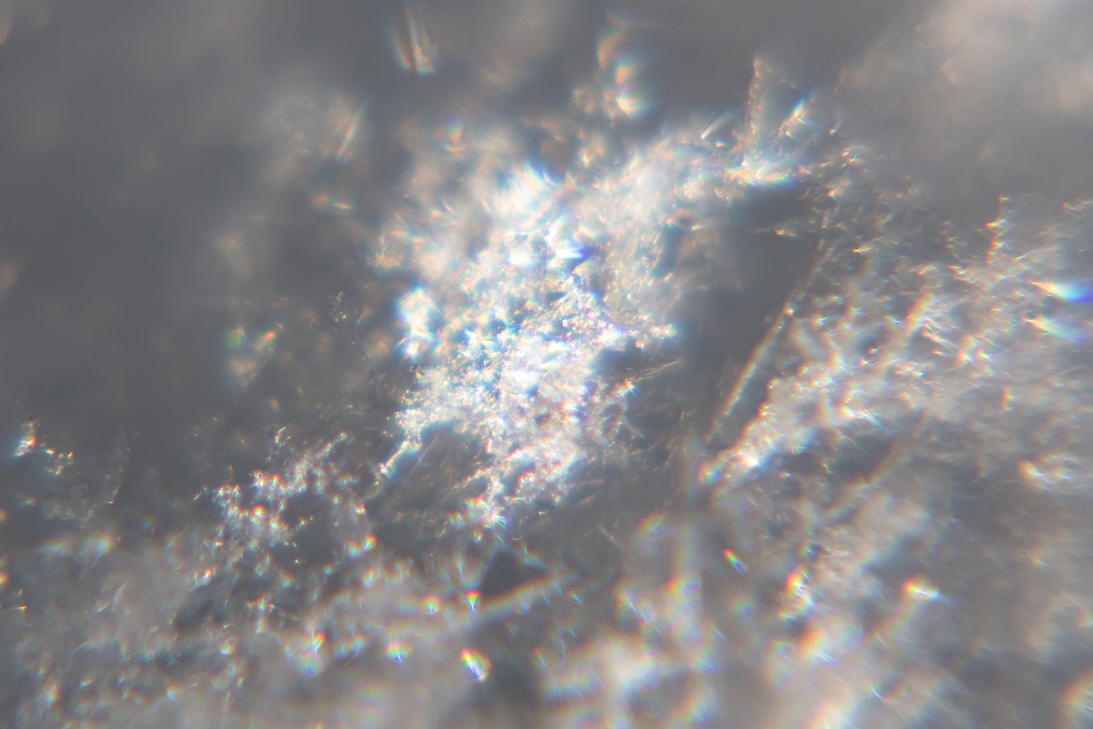 Snow crystals glittering in strong direct sunlight 33 - cropped