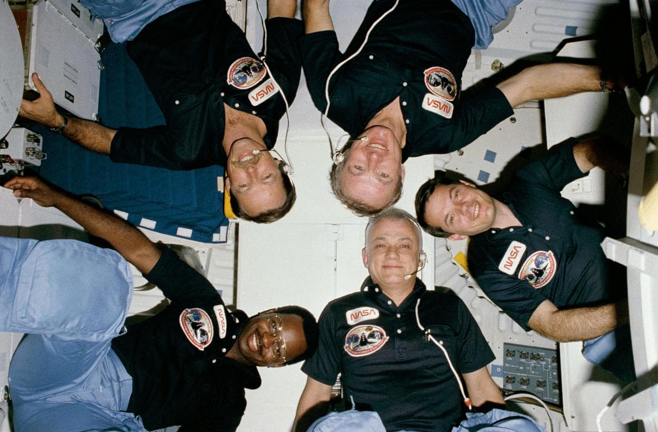 "Star Burst" style crew portrait of 41-B crew taken in-cabin
