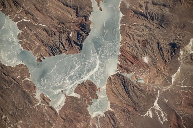 An icy lake in southwestern China's high plateau region